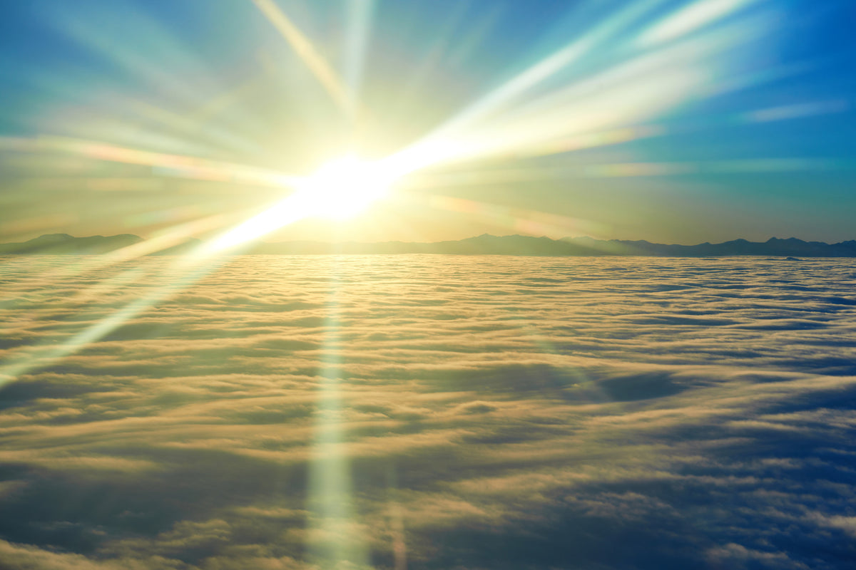 canvas-print-sunrise-above-the-clouds