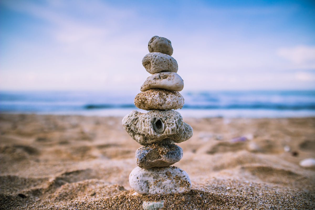 3-piece-canvas-print-stone-pile-on-the-beach