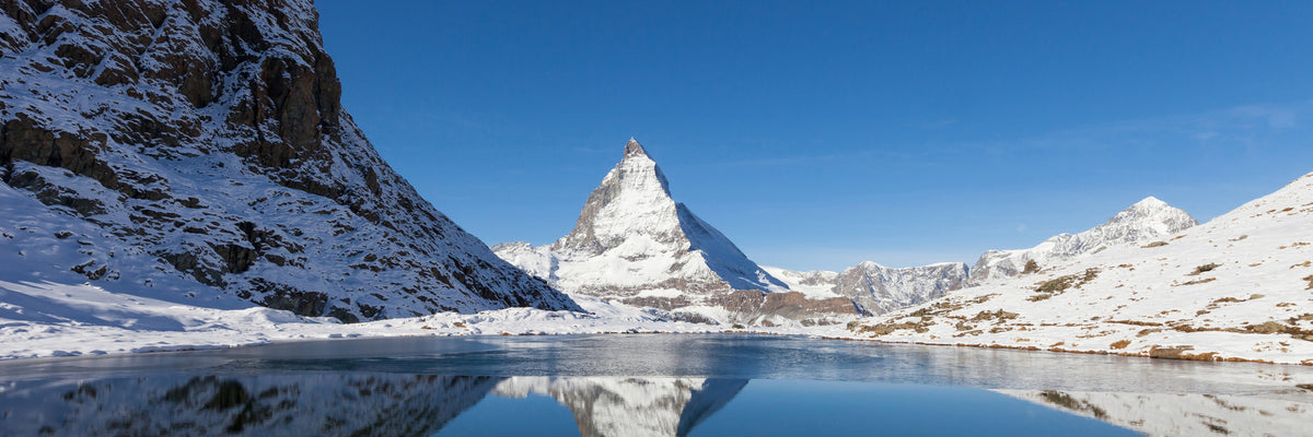 panoramic-3-piece-canvas-print-the-riffelsee-on-matterhorn-panorama